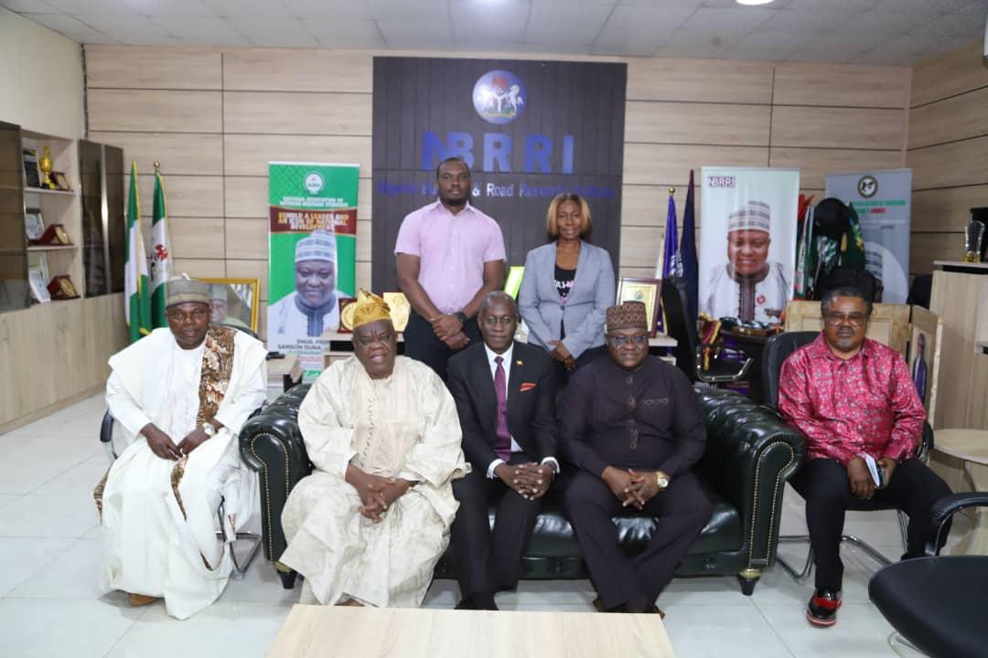 The Chairman/CEO, The Hawaz Group, Chairman, Nigeria Uganda Chamber of Commerce, Industry, Mines and Agriculture, High Commissioner of Uganda & Director General, Nigerian Building and Road Research Institute in a group photo with NBRRI team members